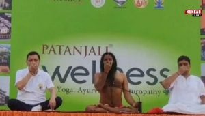 CM Dhami and Baba Ramdev yoga image